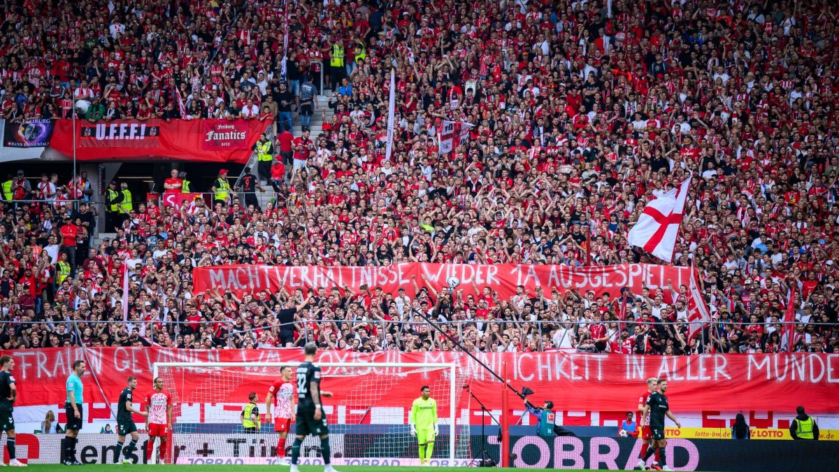 SC Freiburg Supporters Criticize Luis Rubiales and Karl-Heinz Rummenigge in Kiss Scandal – Toxic Masculinity Ignites World Cup Debate