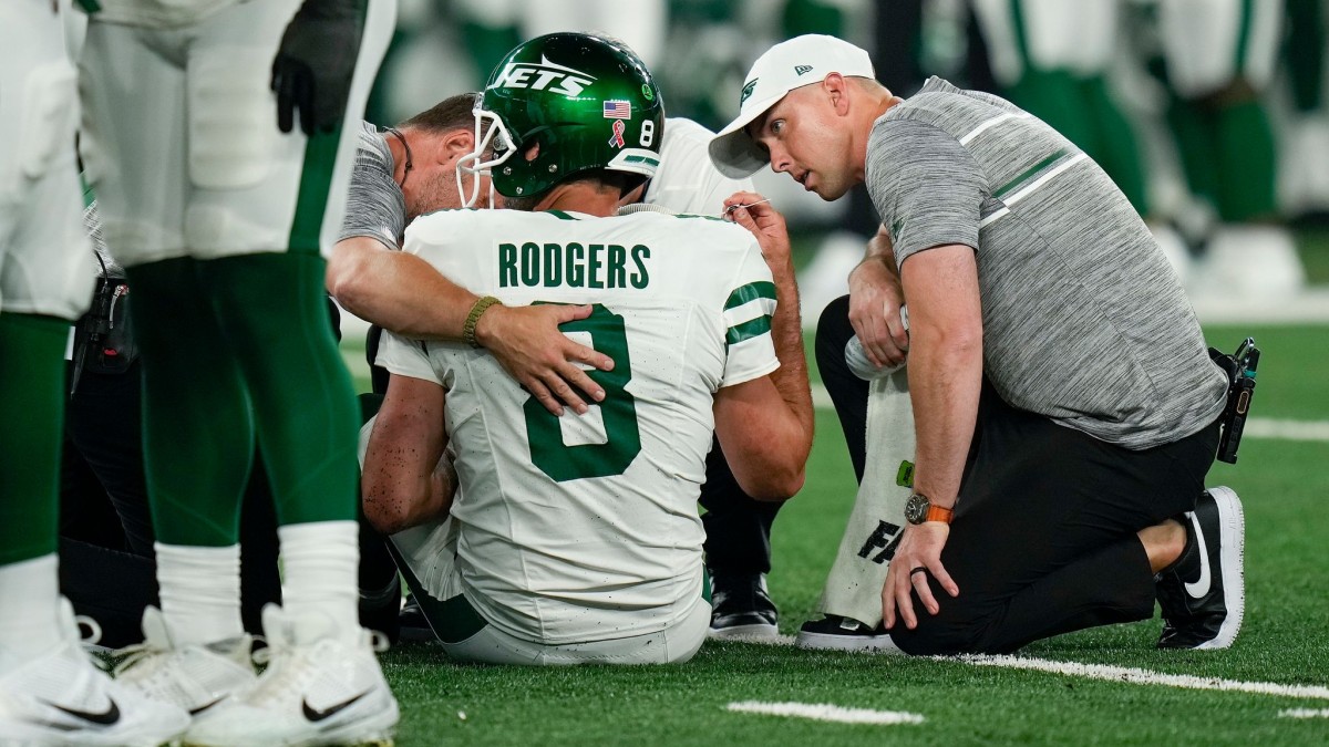 New York Jets Quarterback Aaron Rodgers Injured in Debut Game: Concerns of Torn Achilles Tendon