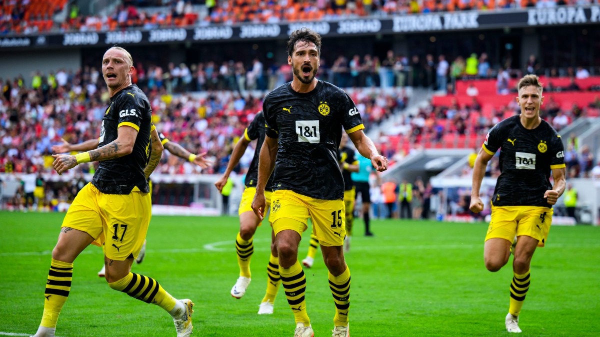 Confident Borussia Dortmund prepares for challenging Champions League clash with PSG