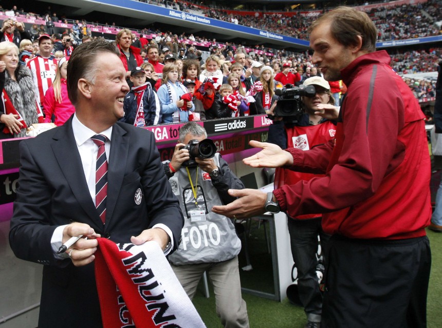 Van Gaal, coach of Munich chats with Tuchel of Mainz before German Bundesliga first division soccer match in Munich