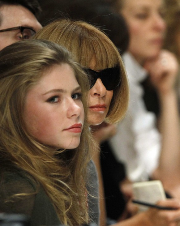 Vogue magazine editor Wintour and her daughter Shaffer watch the presentation of the Burberry Prorsum 2011 Spring/Summer collection at London Fashion Week