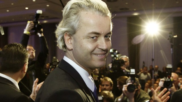 Dutch right-wing politician Wilders of  Freedom Party waves to supporter as he arrives to give speech in Berlin