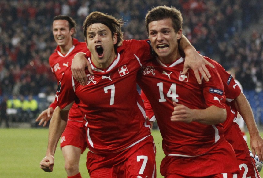 Switzerland's Stocker celebrates after scoring against Wales during their Euro 2012 qualifying soccer match at St Jakob Park stadium in Basel