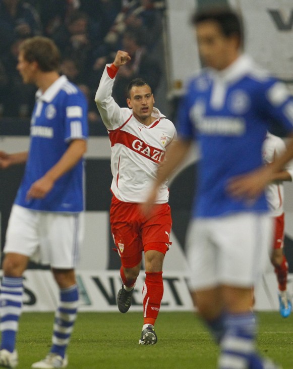 Stuttgart's Gebhart celebrates a goal against Schalke 04 during the German Bundesliga soccer match in Gelsenkirchen