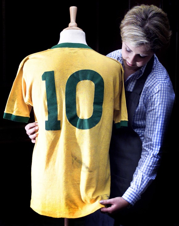 THE SHIRT WORN BY BRAZILIAN FOOTBALL LEGEND PELE IS DISPLAYED AT CHRISTIE'S AUCTION HOUSE IN LONDON