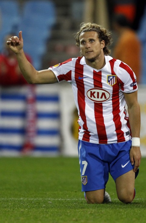 Atletico Madrid's Forlan reacts after a missed scoring opportunity against Rosenborg during their Europa League Group B soccer match at Vicente Calderon stadium in Madrid