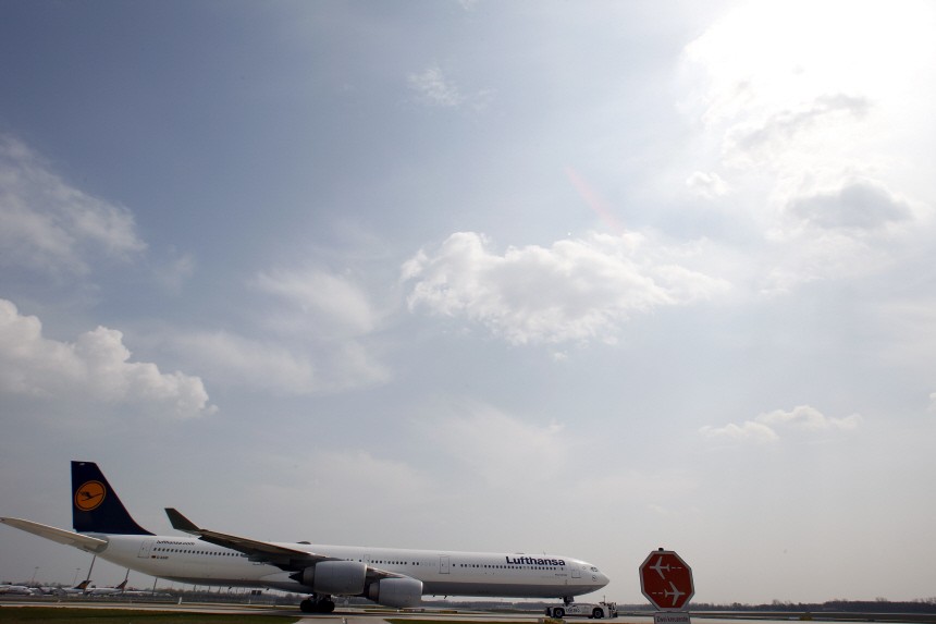 A Lufthansa aircraft taxis on a runway at Munich's international airport