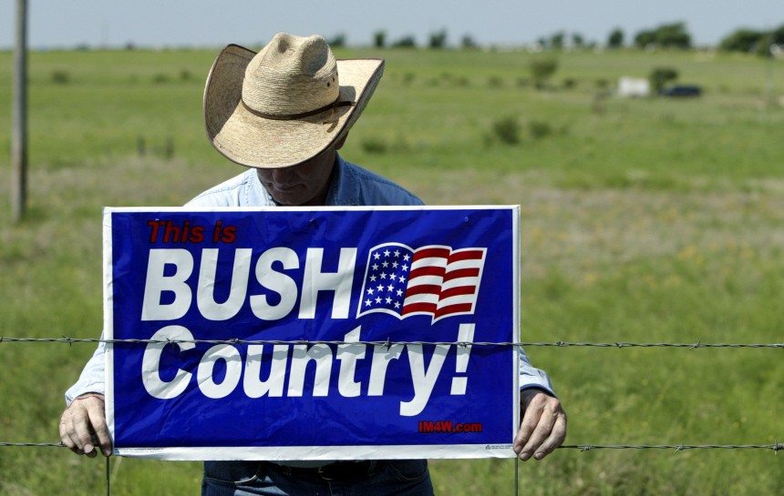 President Bush's supporter puts up sign on fence near the president's ranch in Crawford