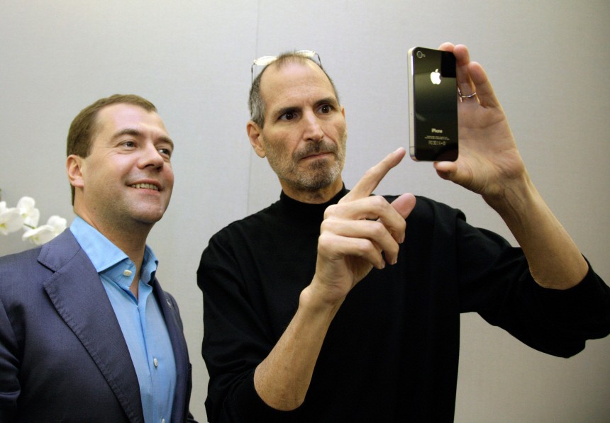 Apple CEO Jobs shows an iPhone 4 to Russia's President Medvedev during his visit to Silicon Valley in Cupertino