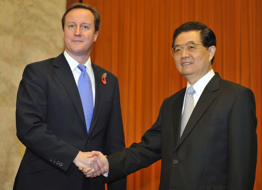 Britain's Prime Minister David Cameron meets China's President Hu Jintao at the Great Hall of the People in Beijing