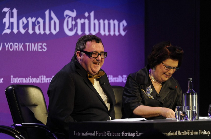 Alber Elbaz, artistic director at Lanvin laughs on stage with Suzie Menkes, fashion director at The International Herald Tribune at the IHT Luxury conference in London