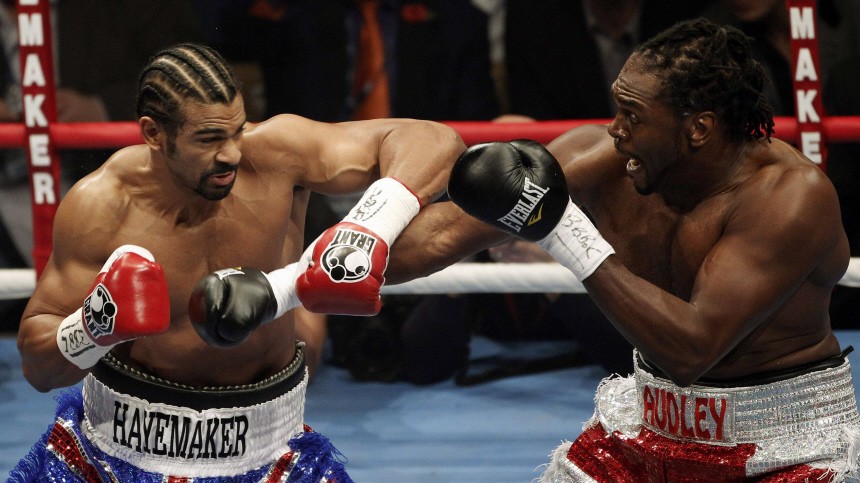 British boxer Haye and compatriot Harrison exchange punches during their WBA world heavyweight title fight in Manchester
