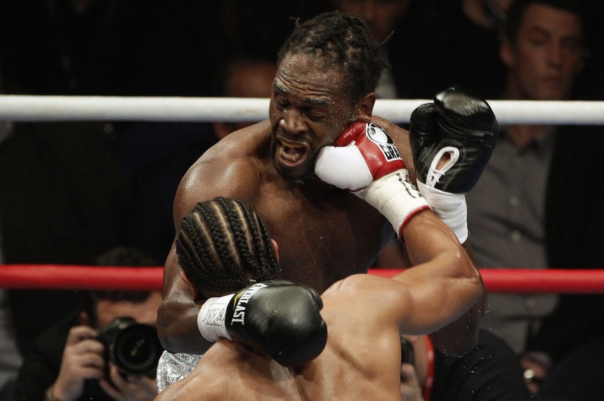 British boxer Haye lands a punch on compatriot Harrison their WBA world heavyweight title fight in Manchester