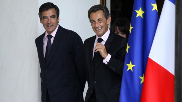 File photo of France's President Sarkozy and Prime Minister Fillon at the Elysee Palace in Paris