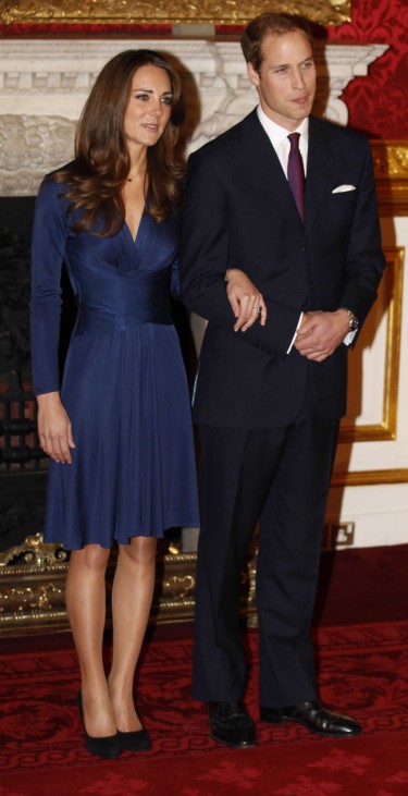 Britain's Prince William and his fiancee Kate Middleton pose for a photograph in St. James's Palace in central London