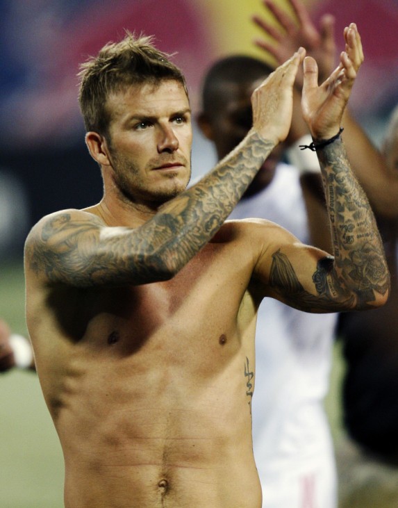 Galaxy's Beckham acknowledges fans as he leaves field after Galaxy defeated Red Bulls in Major League Soccer game in East Rutherford