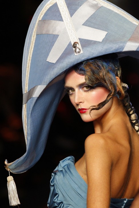 Model presents creation by designer Galliano in Paris