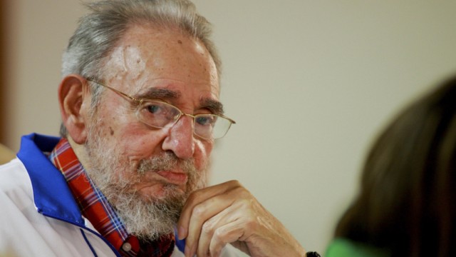 Former Cuban leader Fidel Castro attends an event at Havana University to celebrate the 65th anniversary of his joining the university to initiate his studies in 1945 in Havana