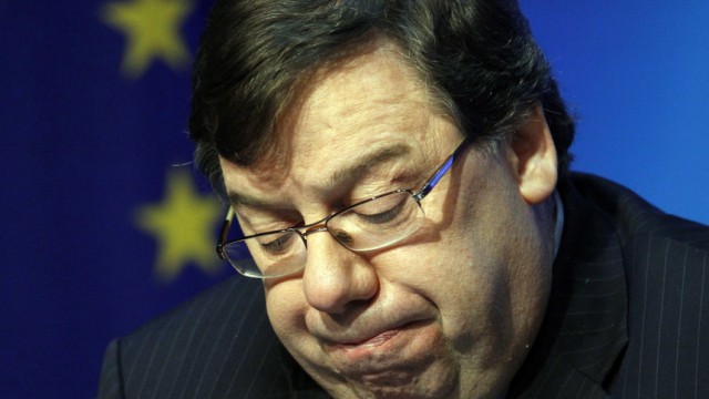Ireland's Prime Minister Brian Cowen pauses during a news conference at Government Buildings in Dublin
