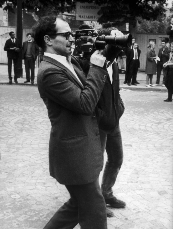 Director Jean-Luc Godard Filming The Events Of May 1968