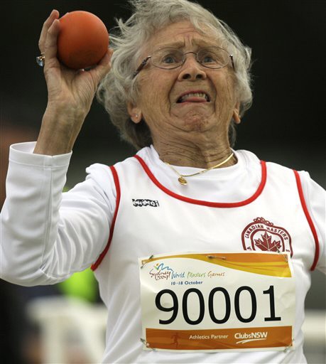 Canada's Olga Kotelko, 90, competes in the women's shot put during the Masters Games in Sydney, Australia, Sunday, Oct. 11, 2009. (AP Photo/Rick Rycroft)
