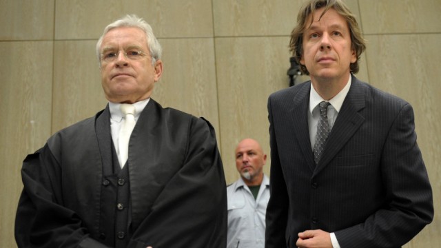 Defendant Swiss meteorologist and TV weather host Kachelmann and new lawyer Schwenn appear at the country court in Mannheim