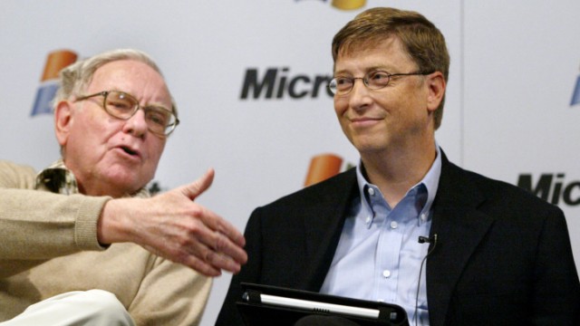 File photo of Warren Buffet and Bill Gates speaking during a news conference in Washington