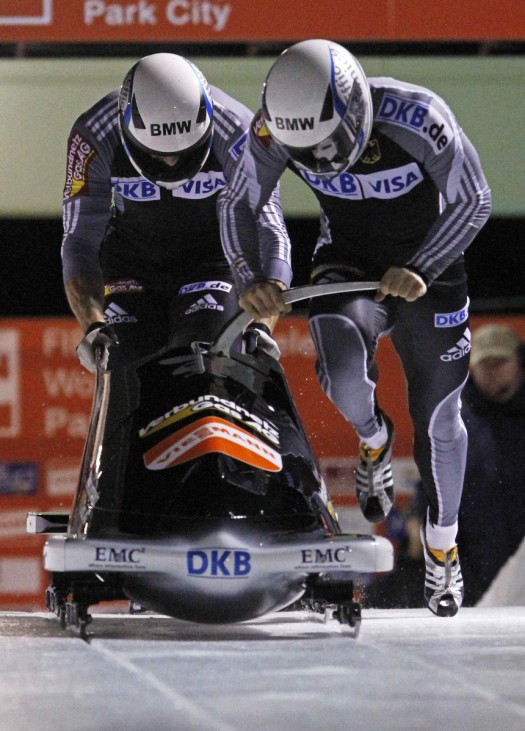 German team bobsled members Bredau and Machata push off during the FIBT Men's Two Man Bobsled World Cup in Park City