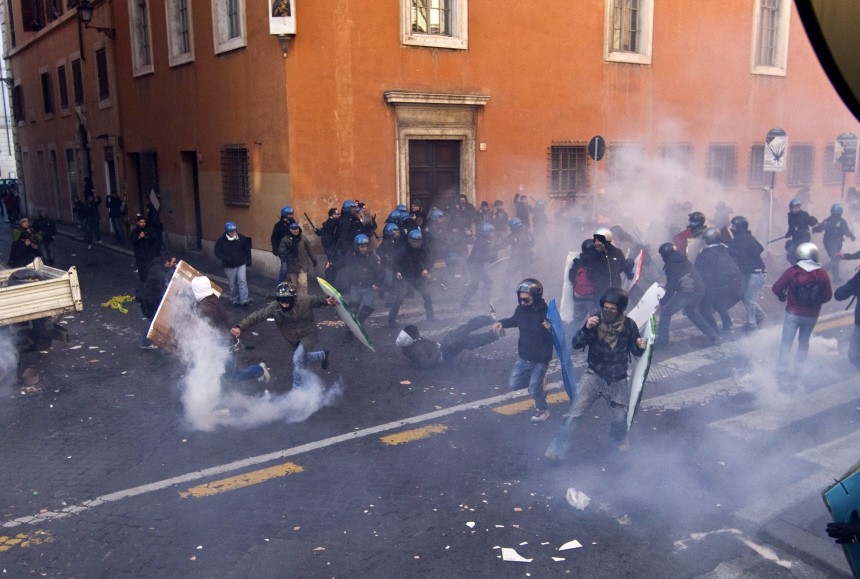 Anti-government protesters clash with riot police in Montecitorio