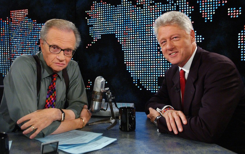 File picture shows former U.S. President Clinton speaking with television personality King on CNN in New York