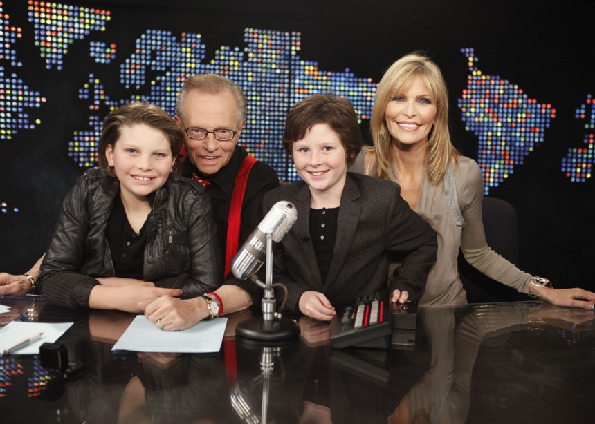 Larry King poses with his wife Shawn and children Chance and Cannon at the set of the final broadcast of Larry King Live at the Los Angeles studio