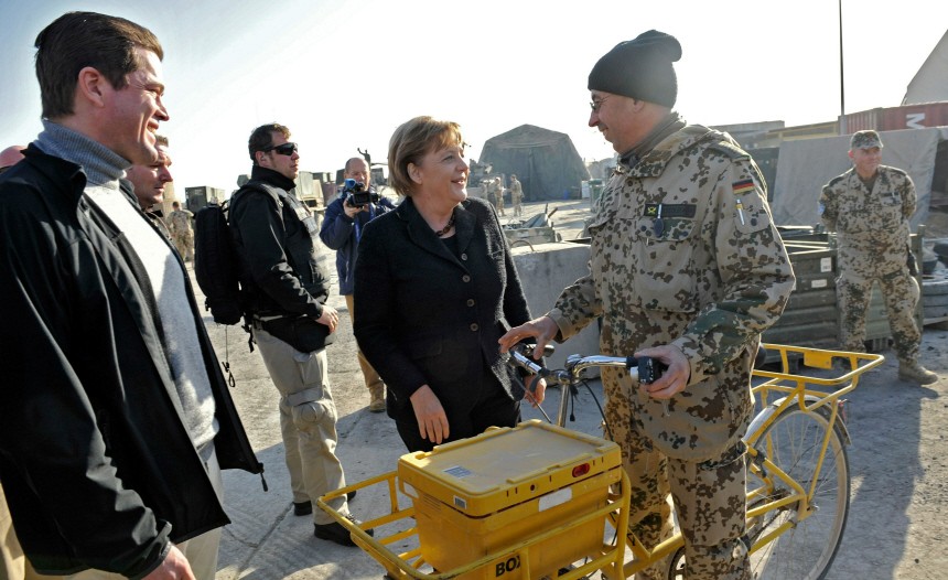 Chancellor Merkel Visits ISAF Soldier Camp In Kunduz