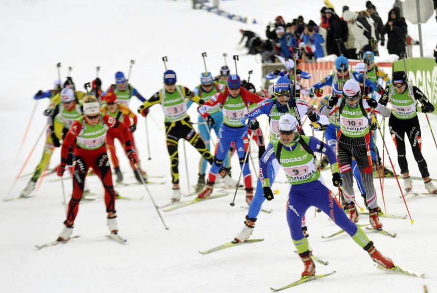 Athletes start competition at the mixed 2 x 6 + 2 x 7.5km relay biathlon World Cup event in Pokljuka