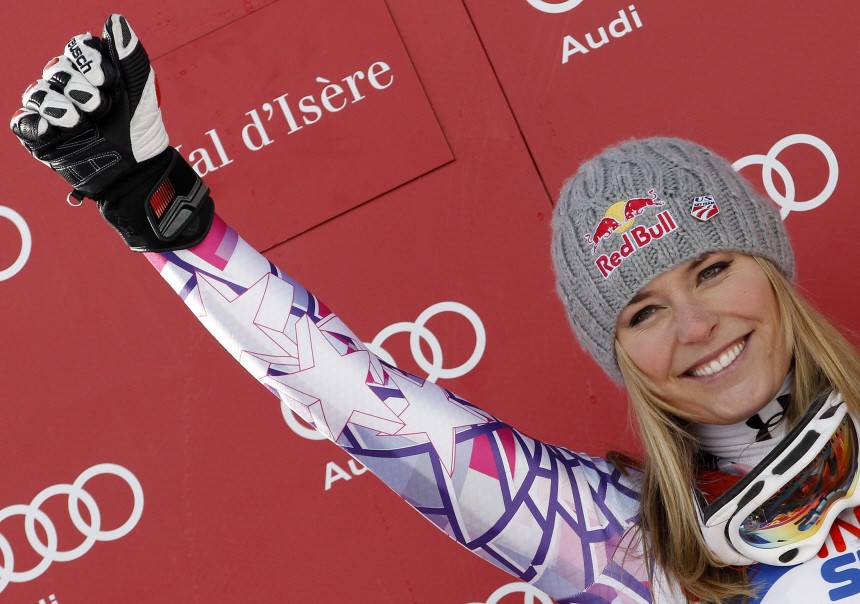 Lindsey Vonn of the U.S. celebrates on the podium after winning the women's Alpine Skiing World Cup downhill event in Val d'Isere