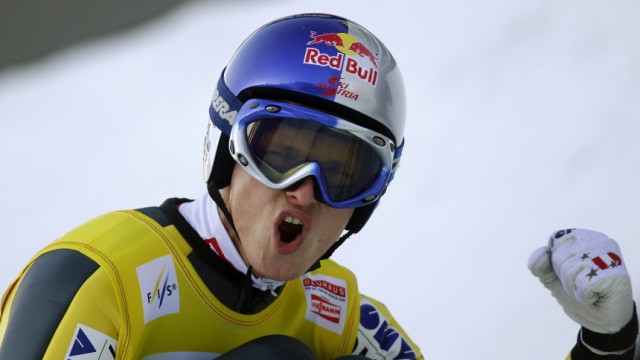 Austria's Morgenstern reacts after winning third event of the Four-Hills ski jumping tournament in Innsbruck