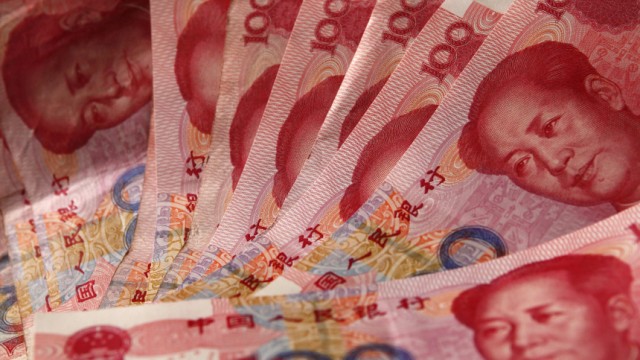 Yuan banknotes are seen in this picture illustration taken in Beijing