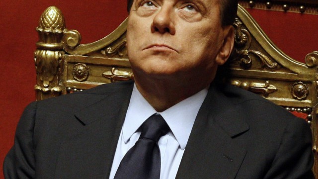 Italian Prime Minister Silvio Berlusconi attends a session at the Senate in Rome