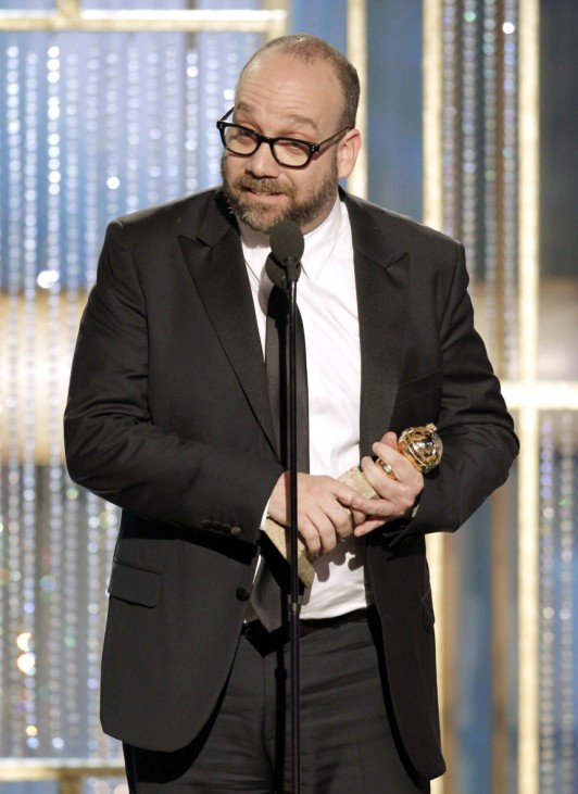 Paul Giamatti accepts the best actor in a motion picture, comedy or musical award for  'Barney's Version'at the 68th annual Golden Globes Awards in Beverly Hills