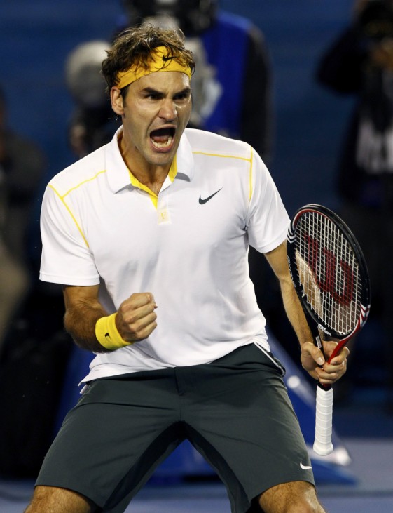 Federer of Switzerland reacts during his match against Simon of France at the Australian Open tennis tournament in Melbourne
