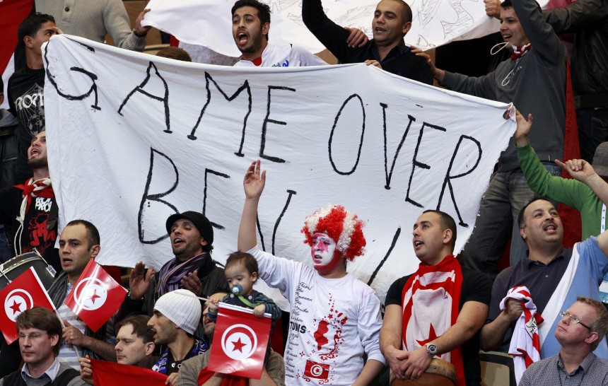 Tunisia's fans hold banner 'Game over Ben Ali' ahead of group A match between Tunisia and Egypt at the Men's Handball World Championship in Kristianstad