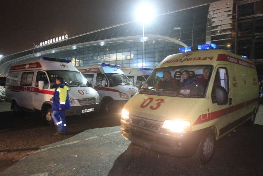 Emergency vehicles are seen in front of Moscow's Domodedovo airport
