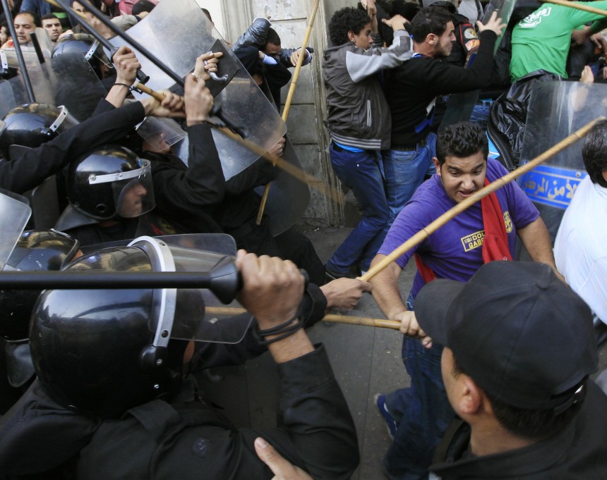 Riot police clash with protesters in Cairo