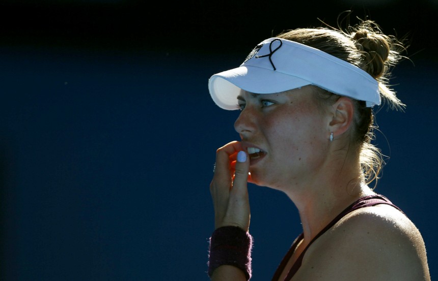 Zvonareva of Russia reacts during her match against Clijsters of Belgium during their semi-final match at the Australian Open tennis tournament in Melbourne