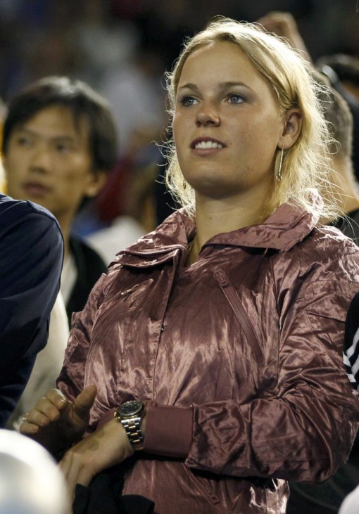Wozniacki of Denmark watches the semi-final match between Murray of Britain and Ferrer of Spain at the Australian Open tennis tournament in Melbourne