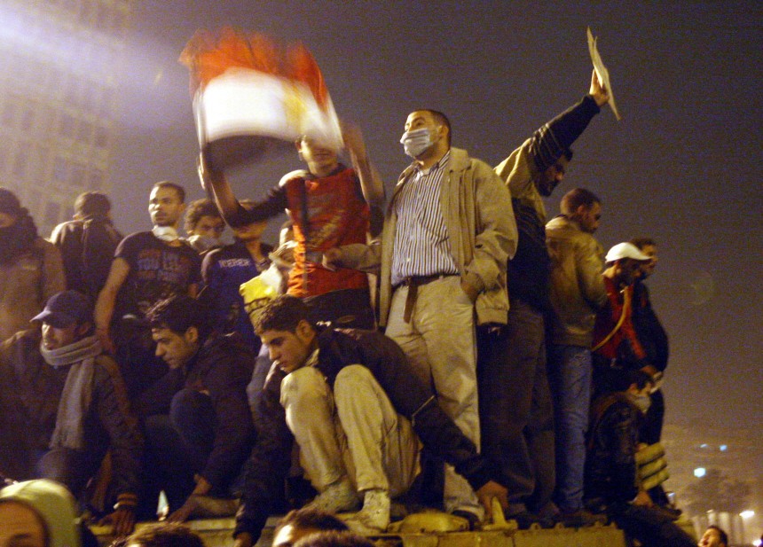 Egypt under curfew as protests continue