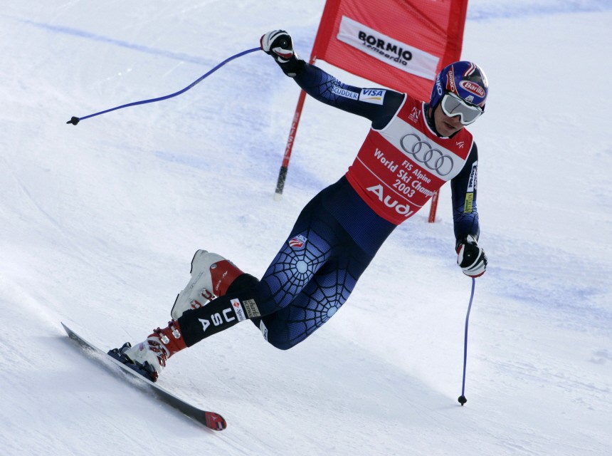 Bode Miller of the US skis with one ski only during the men's combined downhill at the Alpine World Ski Championships in Bormio