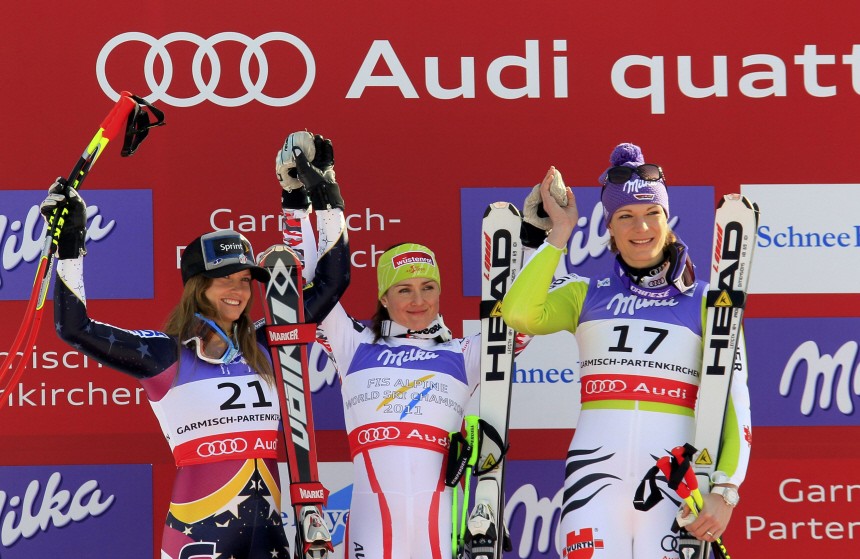 Mancuso of the U.S, Goergl of Austria and Riesch of Germany celebrate during the winner's presentation after the women Super-G race at the Alpine Ski World Championship in Garmisch-Partenkirchen
