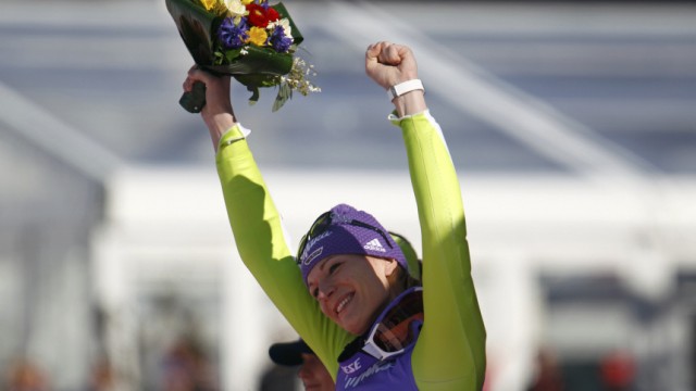 Riesch of Germany celebrates third place after her Super-G race at the Alpine Ski World Championship in Garmisch-Partenkirchen