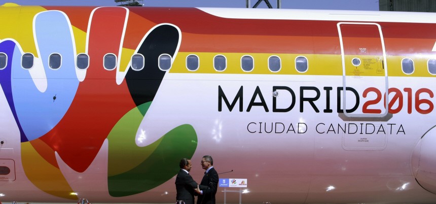 Madrid's mayor Ruiz-Gallardon greets Vazquez, new chairman of Spanish airline Iberia, after unveiling Iberia's plane at Iberia's La Munoza facilities, outside Madrid