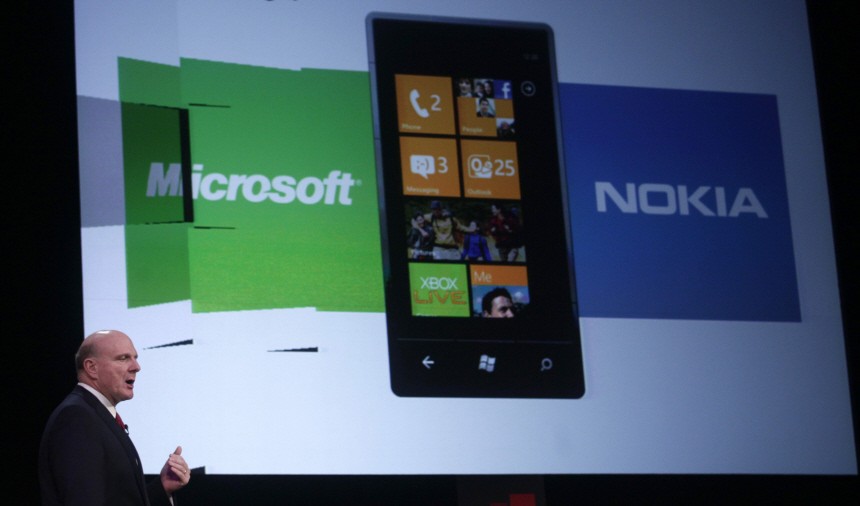 Microsoft's CEO Steve Ballmer gestures during a conference at the GSMA Mobile World Congress in Barcelona